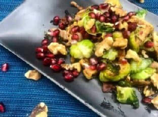 Brussels Sprouts Cooked in Bacon Fat with Walnuts and Pomegranate